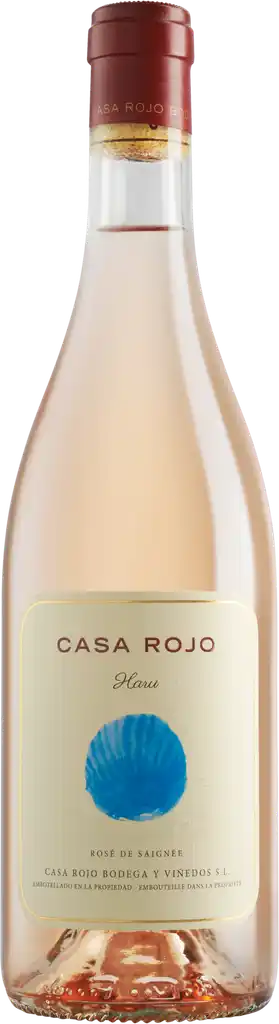 Bottle of Casa Rojo Haru organic rosé wine with label against a neutral background.