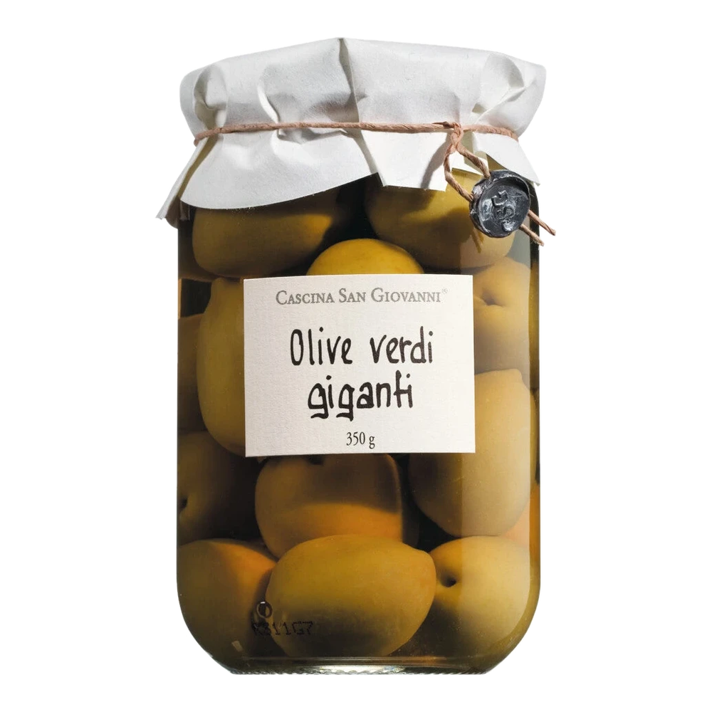 Large green table olives with pit in brine – Olive verdi giganti, firm to the bite and juicy in a jar.