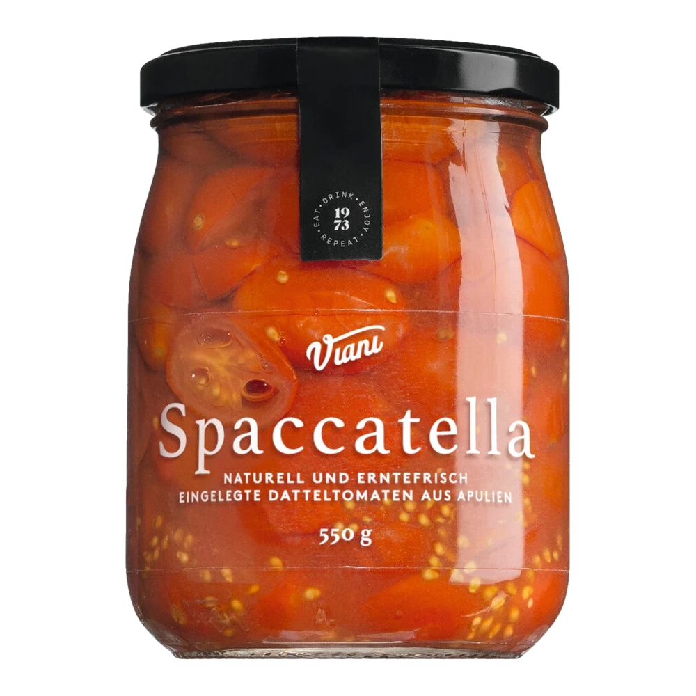 Jar of Spaccatella by Antonio Viani Importe with halved Apulian date tomatoes and basil in a light juice