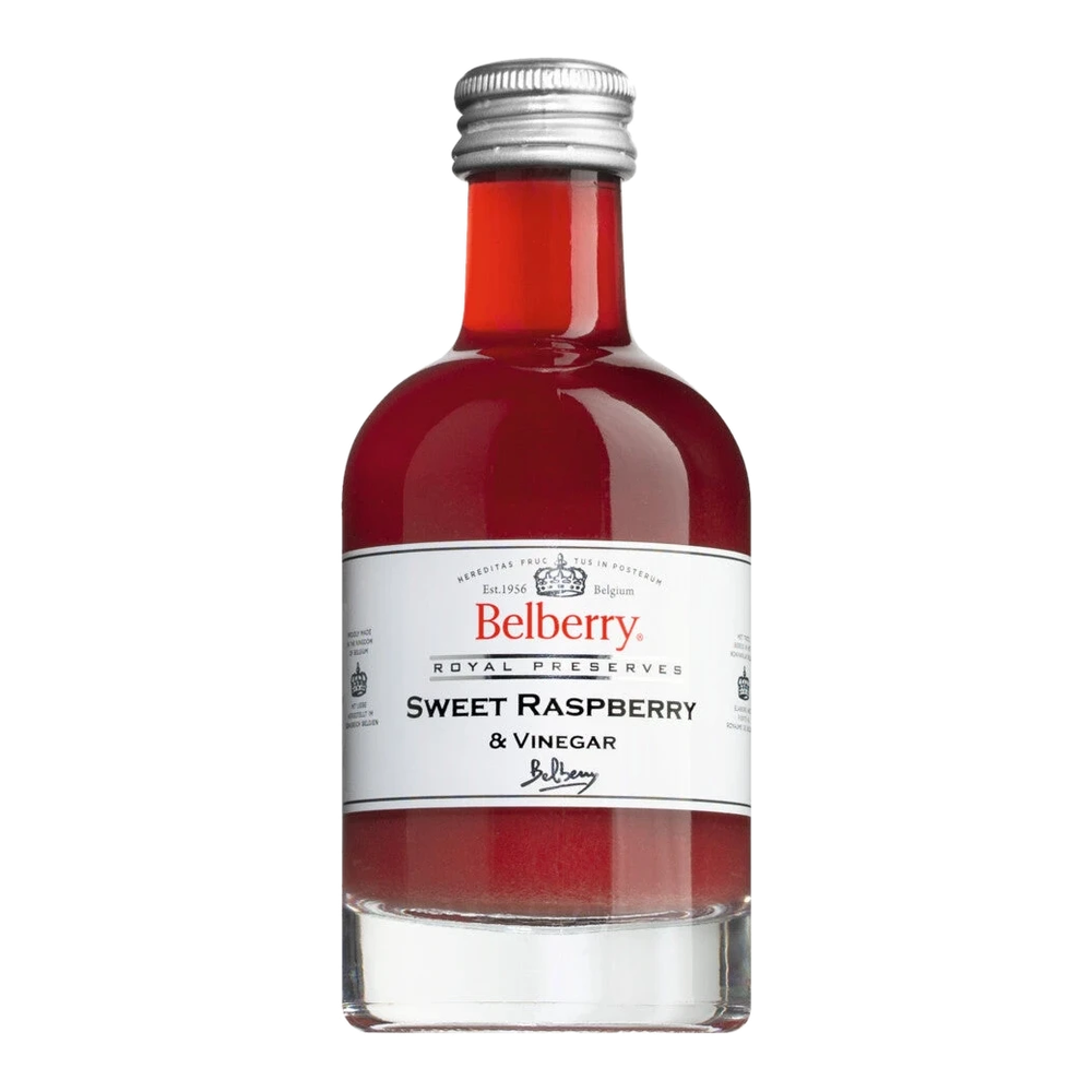 Bottle of Sweet Raspberry Vinegar, raspberry vinegar with fruit pulp, slightly syrupy consistency, deep red color