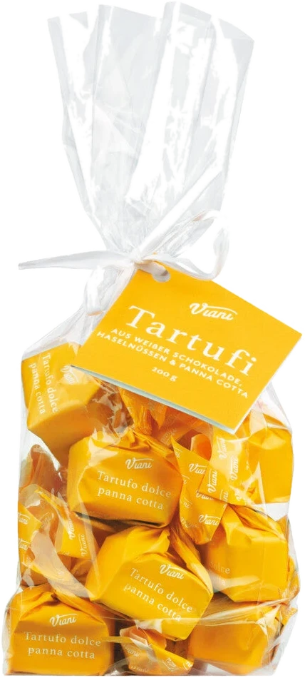 Weiße Schokoladentrüffel Tartufi dolci panna cotta im Beutel, mit Sahnecreme gefüllt, außen in Kakao gewälzt.