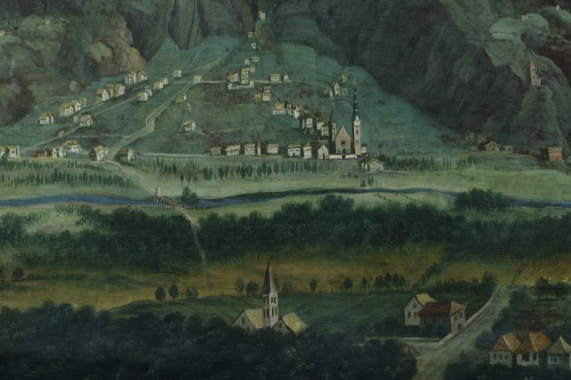 Cantina Terlan: Weingut im Südtiroler Etschtal, umgeben von alpinen Weinbergen auf vulkanischem Porphyrboden.