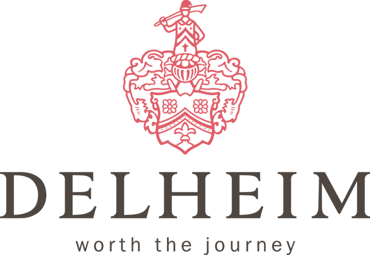 Delheim-Logo: Weingut am Simonsberg, Südafrika, gegründet von Hans Otto Hoheisen.