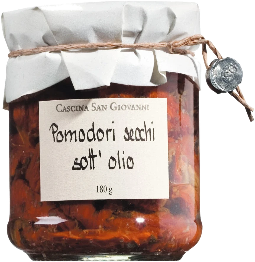 Glas mit sonnengetrockneten Tomaten in Olivenöl mit Kräutern und Knoblauch — Pomodori secchi sott'olio, Antipasti