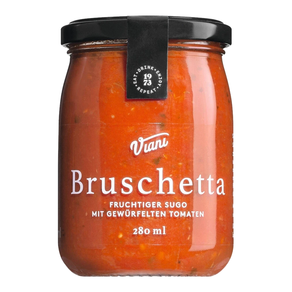 Bruschetta sugo with diced tomatoes in a jar – robust sauce with visible tomato pieces.