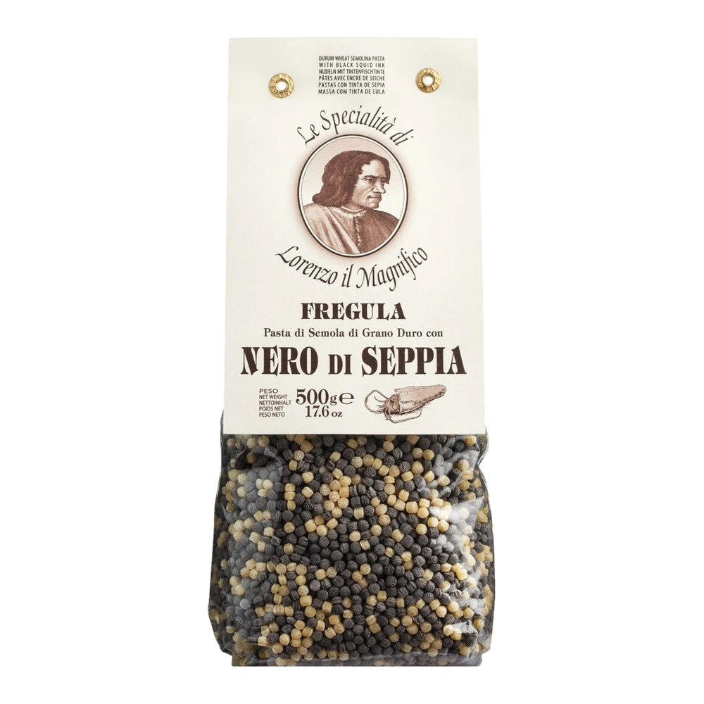 Fregola Nero di seppia: light and ink-black toasted durum wheat balls in a bowl