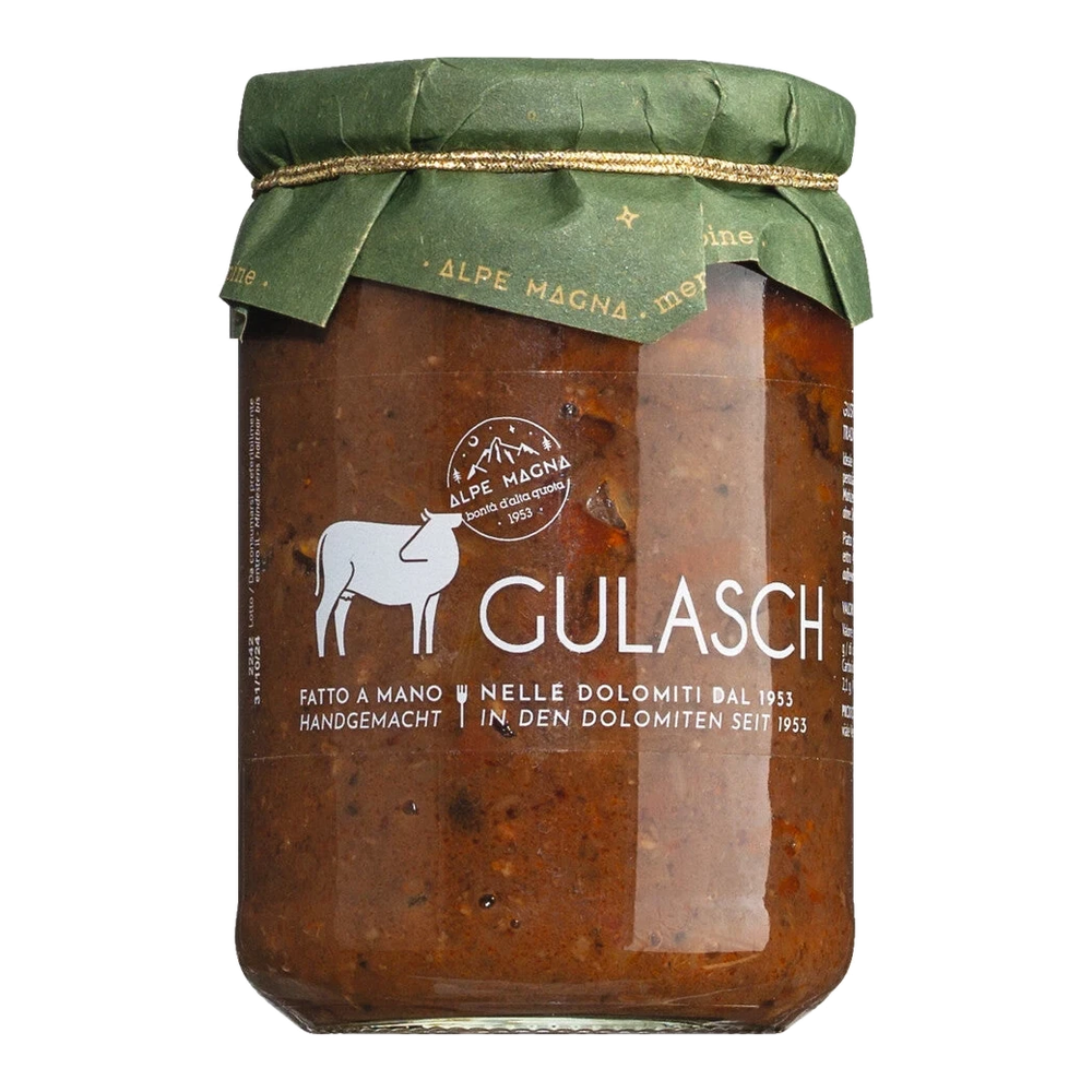 Beef goulash from the Dolomites with smoked speck and Trentino red wine, hand-cut meat pieces in dark sauce