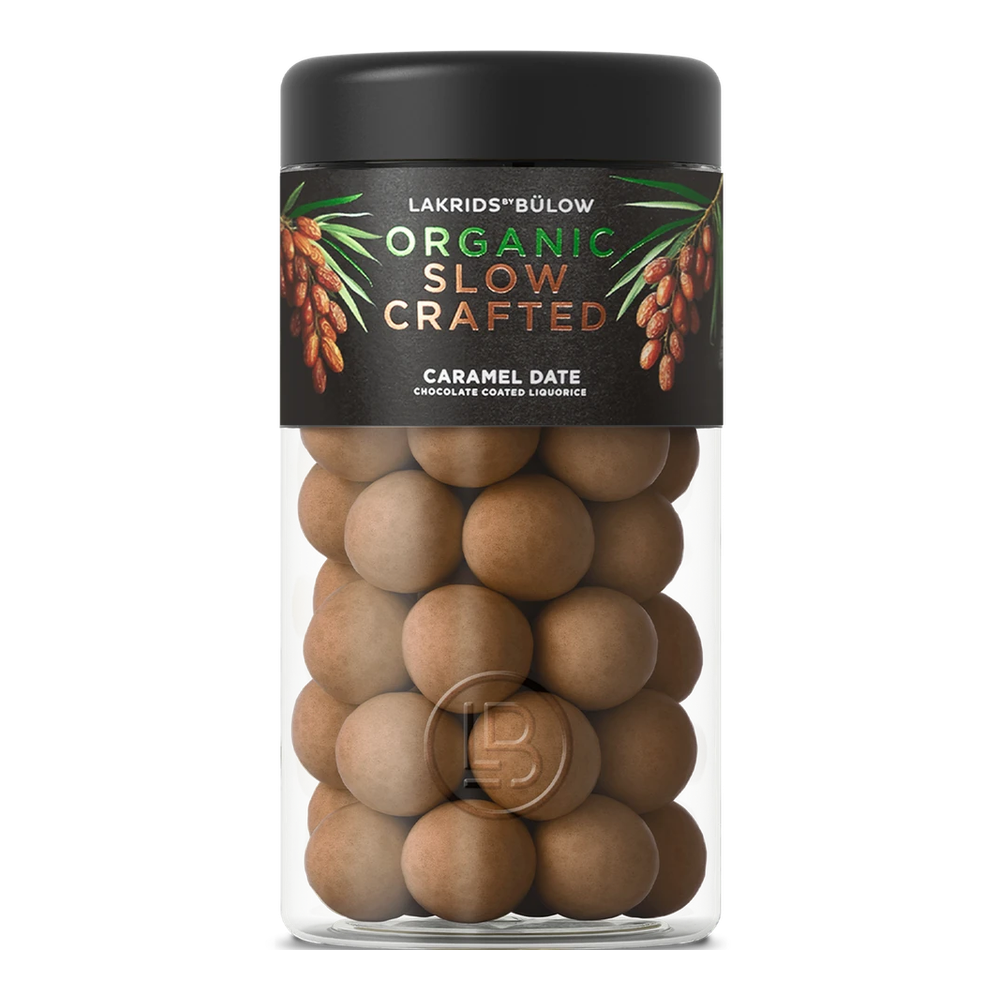 Lakrids by Bülow CARAMEL DATE – black tin with gold design, filled with glazed liquorice caramel date balls
