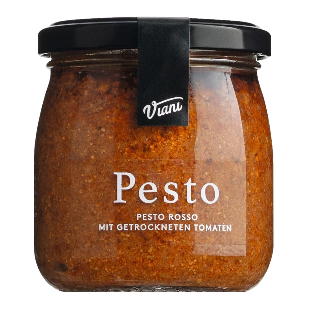 Jar of Pesto Rosso with sun-dried tomatoes by Antonio Viani Importe, red spread with visible tomato pieces