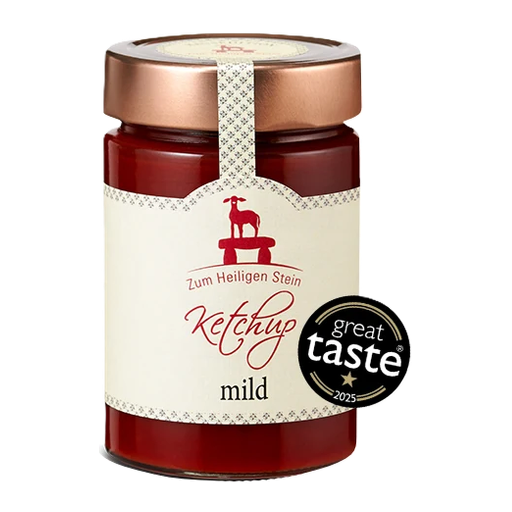 Zum Heiligen Stein mild ketchup, 400g – glass bottle with a red label on a white background.