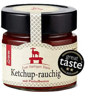 Zum Heiligen Stein GmbH Ketchup rauchig, 200g Glas mit rotem Etikett auf weißem Hintergrund.
